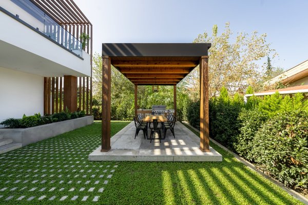 Modern New Built Exterior - The exterior façade and landscaping were redesigned to refresh the home’s appearance and create a strong, cohesive curb appeal. The updated façade features clean architectural lines and refined finishes that complement the home’s character while giving it a more modern, elevated presence.

The landscape design was thoughtfully planned to enhance the exterior without overwhelming it. A balanced combination of planting, hardscape elements, and outdoor details creates a welcoming approach and a seamless transition between the home and its surroundings. The result is an exterior that feels polished, intentional, and fully aligned with the interior transformation.