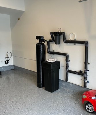 Water Softener Install - Hard water can take a toll on your plumbing, appliances, and even your skin. We install whole-home water softening systems designed to reduce mineral buildup, improve water quality, and help your plumbing system last longer.
Installation includes evaluating your home’s water supply, properly tying the system into the main water line, setting up the softener for optimal performance, and testing the system to ensure everything is operating correctly. We take care to install cleanly and efficiently, with clear explanations on how to use and maintain your new system.
A properly installed water softener can help reduce scale buildup, improve soap efficiency, extend the life of water-using appliances, and provide noticeably better water throughout the home. Water Softener Install - Hard water can take a toll on your plumbing, appliances, and even your skin. We install whole-home water softening systems designed to reduce mineral buildup, improve water quality, and help your plumbing system last longer.
Installation includes evaluating your home’s water supply, properly tying the system into the main water line, setting up the softener for optimal performance, and testing the system to ensure everything is operating correctly. We take care to install cleanly and efficiently, with clear explanations on how to use and maintain your new system.
A properly installed water softener can help reduce scale buildup, improve soap efficiency, extend the life of water-using appliances, and provide noticeably better water throughout the home.