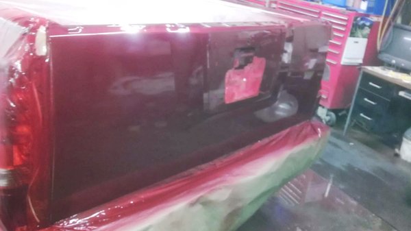 Body Repair - Painted a candy red quarter panel in this Nissan titan Body Repair - Painted a candy red quarter panel in this Nissan titan
