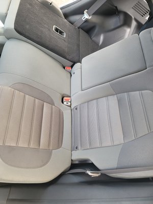Honda CRV - This Honda CRV came in with some really deeps stains in the cloth seats and door panels. The type of cloth is different than most cars because it has a textured suede to it. Over all the car came out looking amazing!