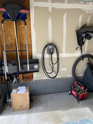 Chargepoint Homeflex EV charger install - This was a Chargepoint HomeFlex hardwired Level 2 EV charger installation inside of a residential garage. A new 240V 60A circuit was ran from the electrical panel on the back corner of the home, through the unfinished basement, into the garage.