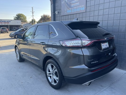 Ford Edge rear bumper and tail gate replair - Rear bumper and tailgate repaired. Side of vehicle repaired. Door Mirros replaced.
