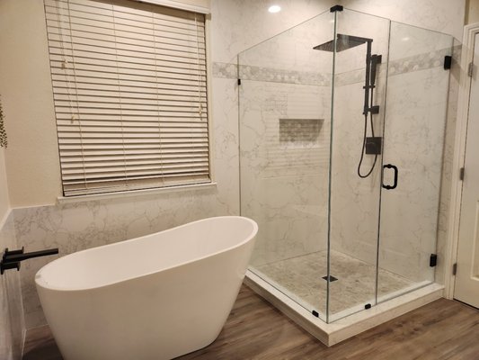 Elk Grove bath remodel - This bathroom remodel included a new soaker tub, custom shower with rainfall shower head and glass enclosure, new vanity with top and flooring. Elk Grove bath remodel - This bathroom remodel included a new soaker tub, custom shower with rainfall shower head and glass enclosure, new vanity with top and flooring.