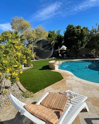 Artificial grass install in Glendale AZ - This install was the finishing touch to this beautiful backyard.
The home owners started by building the pool which took longer than expected, unfortunately the pool was not ready by summer. After finally being completed we were hired to finish the landscape around the pool, adding a paver border, artificial grass, decorative rock, and new irrigation. The project came out fantastic and we are sure the owners cannot wait to enjoy their new backyard.