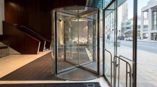 Commercial Revolving Glass Door Repair – NYC - Commercial revolving glass door project completed at a high-traffic NYC property.

The work involved servicing the architectural glass and components of the existing revolving entrance system while maintaining the original stainless-steel framing and surrounding glass storefront.

Revolving doors require careful measurements, alignment, glass handling, and attention to the existing hardware to ensure the finished system maintains a clean appearance and proper operation.

Window Man NYC provides commercial door and entrance glass services throughout NYC, including revolving doors, storefront doors, glass entrances, aluminum framing, door glass replacement, and specialty architectural glazing.