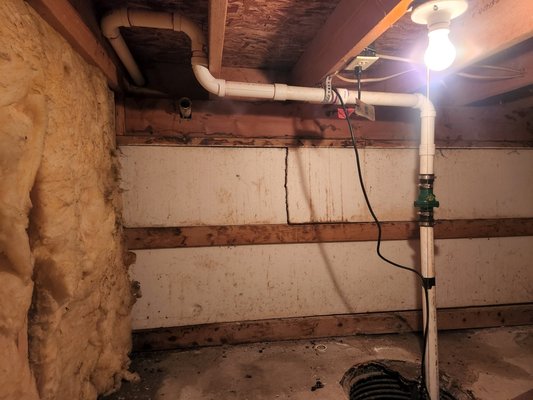 sump pump install with plumbing - customer had water coming into the lower level,we installed new sump line and diverted away from building,leak is no longer present