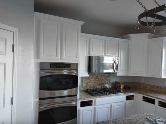 Cabinet Painting and Refinish - Client was interested in updating her kitchen, was interested in giving it a more modern flare and I think it was accomplished Cabinet Painting and Refinish - Client was interested in updating her kitchen, was interested in giving it a more modern flare and I think it was accomplished