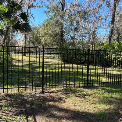 5' High Black Aluminum Fence - This client needed a custom shape for their dog training company and trusted us to make their ideas into reality. Within two weeks of their free on-site estimate, we were able to pull permits and install for their dogs to enjoy. 5' High Black Aluminum Fence - This client needed a custom shape for their dog training company and trusted us to make their ideas into reality. Within two weeks of their free on-site estimate, we were able to pull permits and install for their dogs to enjoy.