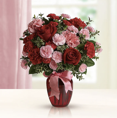 Roses - There is nothing more romantic than red roses and at Lily & Vine Floral and Gifts in Stevens Point, WI, we have all types of romantic bouquets to choose from. Roses aren’t just for Valentine’s Day, select roses in white, pink or yellow to make someone smile! Roses - There is nothing more romantic than red roses and at Lily & Vine Floral and Gifts in Stevens Point, WI, we have all types of romantic bouquets to choose from. Roses aren’t just for Valentine’s Day, select roses in white, pink or yellow to make someone smile!