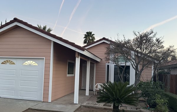 Exterior - Siding, Trim and doors - This customer wanted to freshen up his exterior paint job. They replaced all the wood siding and fascia. They wanted to keep the original color of the house which they purchased 30 years ago. We painted his siding a salmon color and his trim and garage door white. Exterior - Siding, Trim and doors - This customer wanted to freshen up his exterior paint job. They replaced all the wood siding and fascia. They wanted to keep the original color of the house which they purchased 30 years ago. We painted his siding a salmon color and his trim and garage door white.