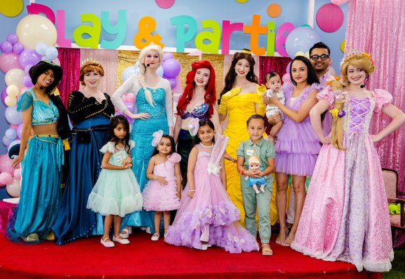 PRINCESS DELUXE PACKAGE - This beautiful party deserves to be featured as an example of our upgraded options. This family ordered 5 princesses, upgraded decorations, a face-painter, custom backdrops and props. We are so proud that this party is one of our 5 Star Reviews and we wanted to share it with you. PRINCESS DELUXE PACKAGE - This beautiful party deserves to be featured as an example of our upgraded options. This family ordered 5 princesses, upgraded decorations, a face-painter, custom backdrops and props. We are so proud that this party is one of our 5 Star Reviews and we wanted to share it with you.