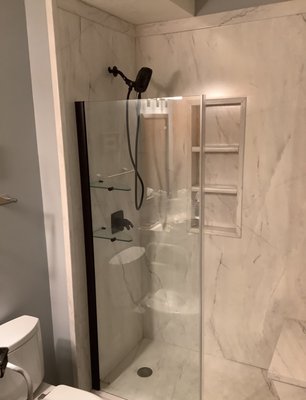 Sioux Falls, SD Tub to Shower Transformation designed by Five Star Bath Solutions of Sioux Falls - Five Star Bath Solutions of Sioux Falls completed a tub-to-shower conversion in Sioux Falls, replacing an old fiberglass tub with a fabulous new walk-in shower. This bathroom remodel improved safety, style, and functionality—creating a clean, modern space the homeowner loves.