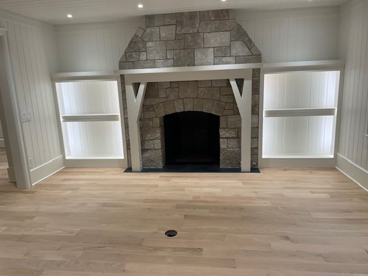 Changed the flooring from dark brown to a raw wood look - The floor had been stained dark brown and the new customers wanted a lighter more elegant look and chose to go with a raw wood look on their 5” select white oak floors. Roughly 2500 sq ft where we added 700 sq ft new. Changed the flooring from dark brown to a raw wood look - The floor had been stained dark brown and the new customers wanted a lighter more elegant look and chose to go with a raw wood look on their 5” select white oak floors. Roughly 2500 sq ft where we added 700 sq ft new.
