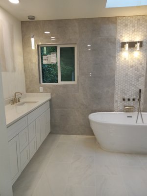 bathroom remodeling - in this project we have made very nice modifications such as demolition, installation of tile vanity, countertop relocation of the plumbing, electricity, installation of the freestanding bath tub and shower bathroom remodeling - in this project we have made very nice modifications such as demolition, installation of tile vanity, countertop relocation of the plumbing, electricity, installation of the freestanding bath tub and shower