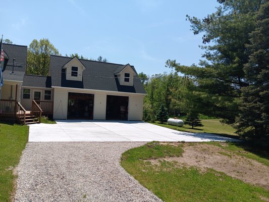 Driveway repair - This customer had issues with their existing driveway being to low and not enough room to turn around without getting stuck in the lawn and causing a muddy mess.
We raised the driveway to a safe dry elevation and added room to turn around. Finishing the project by adding stone to the driveway to raise everything to a dry elevation. Driveway repair - This customer had issues with their existing driveway being to low and not enough room to turn around without getting stuck in the lawn and causing a muddy mess.
We raised the driveway to a safe dry elevation and added room to turn around. Finishing the project by adding stone to the driveway to raise everything to a dry elevation.