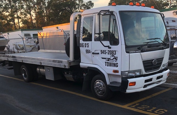 Big D's Tow Truck - When you spot a Big D's Towing tow truck, you can rest assured that you're in safe, reliable hands. Our trucks are more than just vehicles; they represent our commitment to exceptional service and customer care. As a locally-owned and operated business, we pride ourselves on offering dependable and prompt assistance. Whether you're stranded on the roadside, need long-distance hauling, or require specialized services like motorcycle towing or battery assistance, you can trust that Big D's Towing will handle your vehicle with the utmost care and professionalism. Our experienced team is dedicated to ensuring your peace of mind, making your safety and satisfaction our top priorities. Big D's Tow Truck - When you spot a Big D's Towing tow truck, you can rest assured that you're in safe, reliable hands. Our trucks are more than just vehicles; they represent our commitment to exceptional service and customer care. As a locally-owned and operated business, we pride ourselves on offering dependable and prompt assistance. Whether you're stranded on the roadside, need long-distance hauling, or require specialized services like motorcycle towing or battery assistance, you can trust that Big D's Towing will handle your vehicle with the utmost care and professionalism. Our experienced team is dedicated to ensuring your peace of mind, making your safety and satisfaction our top priorities.