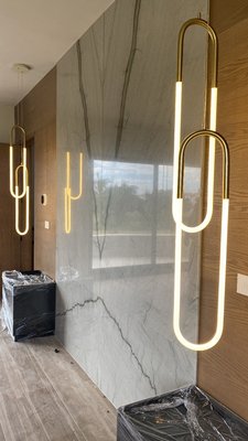 Granite slab installation! - One of our clients was looking for a piece of stone that would go behind his bed, we present him with a few options and this is the one he and his wife decided to go with, measuring 10’ by 6’ it had to be place in 4 different pieces! Call us if you’re looking for some natural stones for your project!