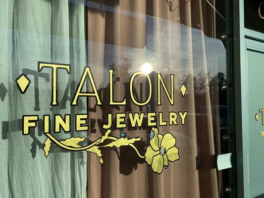 Window Signs for High End Jeweler - Removed old "gold" vinyl and replaced with traditional hand painted 23K gold leaf with mother of pearl accents. Truly the only suitable option for a jeweler. Window Signs for High End Jeweler - Removed old "gold" vinyl and replaced with traditional hand painted 23K gold leaf with mother of pearl accents. Truly the only suitable option for a jeweler.