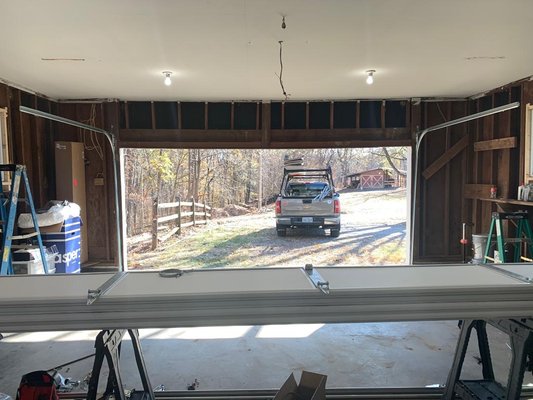 Garage Door and Opener Replacement at Ranch House built in the 70s. - This was a old Ranch House;  built in the 70s.  The garage door was old and did not open at all.  The project included the installation of a new garage door and opener which included a keypad and sensors.  The angle iron was also very old so that was replaced as well.  Very clean finish!  The homeowners were thrilled!