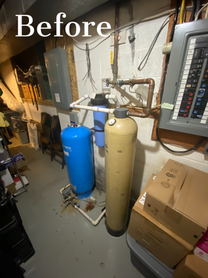 Soda Ash Injection System Install in Clarksburg, Maryland - This customer had contacted Mallick Plumbing & Heating about a water heater replacement and also inquired about updating their outdated water treatment system, which was inherited from the previous homeowner.
Given the age of the existing standard water heater, Mallick Plumbing & Heating replaced the water heater and recommended to the customer that they replace their dated neutralizer with a Soda Ash Injection System as well. This recommendation was prompted due to the customer’s water maintaining a pH level below 5.5, indicating acidity.
While it has no health impact on the customer, acidic water can cause damage to the customer’s plumbing system over time.
The Soda Ash Injection system will consistently bring the customer’s well water to a neutral 7.0, minimizing any corrosion within the plumbing system while also extending the lifespan of the newly installed water heater. Soda Ash Injection System Install in Clarksburg, Maryland - This customer had contacted Mallick Plumbing & Heating about a water heater replacement and also inquired about updating their outdated water treatment system, which was inherited from the previous homeowner.
Given the age of the existing standard water heater, Mallick Plumbing & Heating replaced the water heater and recommended to the customer that they replace their dated neutralizer with a Soda Ash Injection System as well. This recommendation was prompted due to the customer’s water maintaining a pH level below 5.5, indicating acidity.
While it has no health impact on the customer, acidic water can cause damage to the customer’s plumbing system over time.
The Soda Ash Injection system will consistently bring the customer’s well water to a neutral 7.0, minimizing any corrosion within the plumbing system while also extending the lifespan of the newly installed water heater.