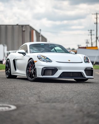 2023 Porsche GT4 - This GT4 was brought to us with the idea of giving it a unique look while still maintaining the classy lines and feel of the track monster. We completed our LLumar full body Matte Paint Protection film wrap paired with our 5 year ceramic coating and Stratos window tint to prevent heat buildup during track days in the cabin. 2023 Porsche GT4 - This GT4 was brought to us with the idea of giving it a unique look while still maintaining the classy lines and feel of the track monster. We completed our LLumar full body Matte Paint Protection film wrap paired with our 5 year ceramic coating and Stratos window tint to prevent heat buildup during track days in the cabin.