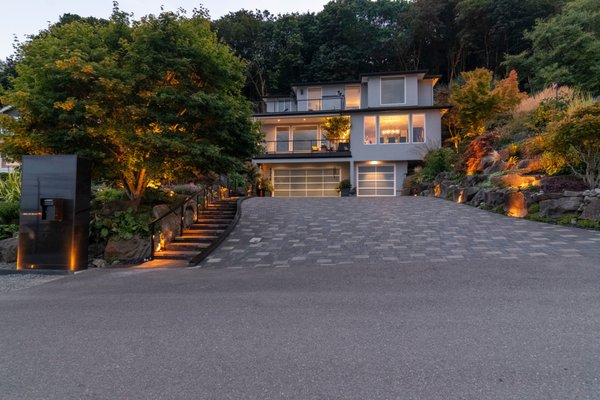 Tacoma Garden residence - Nestled in a serene corner of Tacoma, a unique property radiates with the harmonious blend of art, nature, and meticulous design. Purchased in 1999 and completed in 2003, this residence not only boasts a stunning home but also a continually evolving garden that captivates all who visit. The journey of its transformation is a testament to the homeowner's passion and vision, complemented by the expertise of Northwest Outdoor Lighting.

You can view more of our large portfolio on our website.