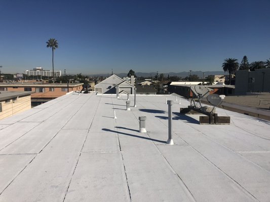 Apartment Complex Roof Replacement Project in Torrance Ca - Three layers of roofing including a rock roof removed. Most of the plywood was damaged due to dry rot and tar, stuck to wood. Installed a modified energy cap coil roof. Apartment Complex Roof Replacement Project in Torrance Ca - Three layers of roofing including a rock roof removed. Most of the plywood was damaged due to dry rot and tar, stuck to wood. Installed a modified energy cap coil roof.