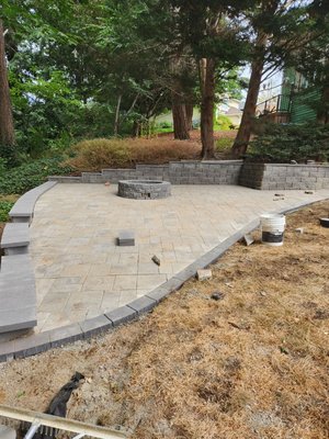 New patio. - this is a brand new patio. the old patio was an old wooden retaining wall and some gravel on the floor with a rotten metal 🔥 pit on the center. New patio. - this is a brand new patio. the old patio was an old wooden retaining wall and some gravel on the floor with a rotten metal 🔥 pit on the center.