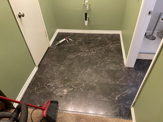Vinyl Bathroom Installation - Take a look at this beautiful Coretec tile look vinyl installed in a customer's bathroom. Vinyl Bathroom Installation - Take a look at this beautiful Coretec tile look vinyl installed in a customer's bathroom.