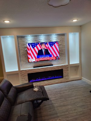 Custom home entertainment center - Customer wants a custom home entertainment center and remolding her living room