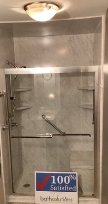 Spencer Iowa Tub to Shower Transformation designed by Five Star Bath Solutions of Sioux Falls - Five Star Bath Solutions of Sioux Falls completed a bathroom remodel in Spencer, Iowa featuring a tub-to-shower conversion. The project replaced an old tub with a sleek, low-threshold walk-in shower to improve safety and accessibility. This upgrade gave the space a fresh, modern look while enhancing daily comfort and functionality