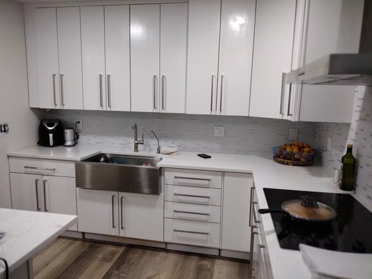 Aurora - this Kitchen was in such a bad shape that all cabinets had to be thrown away and we changed the layout to get most out of the space .
the cabinets were bought at a second hand warehouse and we reconditioned and repurposed all of them for the new kitchen design then all got repainted and we custom made all the door fronts and finish them the end result was stunning
