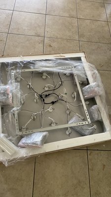 Chandelier installation - This project required making a support in the attic of the house to support the weight of this huge 80lb chandelier, two days of work at a height of 20ft, but the end result was perfect and the clients loved it.