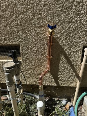 Fix leak at irrigation - Fixed leak and removed abandoned anti-siphon valve and installed new hose bib on side yard per customer request