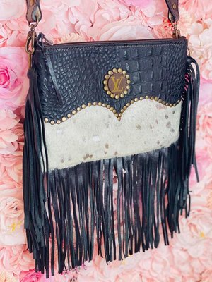 Bags & Wallets - Here are some of our bags and wallets. Check out more on our website!