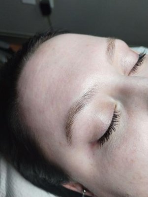 Brow Lamination - Before and after of a brow lamination! Our laminations come with a brow wax and tint for a total cost of $75!