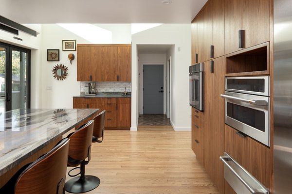 Full house remodel - This impressive renovation adds 500 sq ft of thoughtfully designed living space, featuring a covered deck with a fully equipped outdoor kitchen, built-in heaters, fans, and smart home technology. Inside, enjoy raised ceilings in three rooms, a stunning 12-foot island, all-new lighting throughout, and a spacious, beautifully updated kitchen. The bathroom has been completely remodeled, and the entire exterior now boasts brand-new stucco and over 20 new windows. A new, efficient heating system has also been installed—this transformation truly has it all