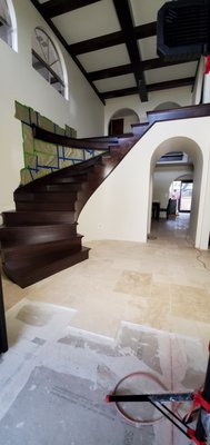 Expresso  Stain staircase - This staircase is maple wood and very tricky to work with. It was used expresso coffee stain and finished with a sprayed clear coat. 
The rails where spray painted with a black finish color.