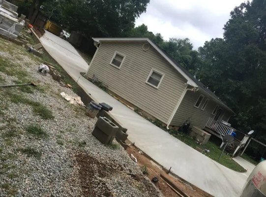 New Driveway Installation - home located in Raleigh. clients wanted to have parking int the back, and relevel the entrance. kept scratching the bottom of the cars. of course we fixed the problem. clients loved it. for your next Install. give us a call 919 510 3075 New Driveway Installation - home located in Raleigh. clients wanted to have parking int the back, and relevel the entrance. kept scratching the bottom of the cars. of course we fixed the problem. clients loved it. for your next Install. give us a call 919 510 3075