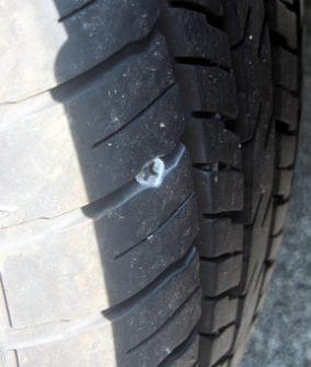 Tire Plug - This customer vehicle's left rear tire would repeatedly go flat, no matter how many times they would add air. After taking an inspection of the tire, it was discovered to have a screw in it causing a slow air leak. We quickly removed the offending screw, plugged the hole, and not only stopped the leak but saved the customer from having to purchase a brand new tire. 
  Job finished and customer saved money in multiple ways!,