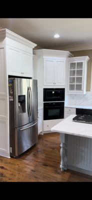 Kitchen Cabinet Refinishing - Complete cabinet refinishing project featuring detailed prep work, professional sanding, premium primer, and a smooth sprayed finish for a factory-style look. These outdated cabinets were transformed with a clean modern color that completely refreshed the kitchen and brightened the entire space. Extra attention was given to clean lines, durability, and a flawless final finish built to last through everyday use. Kitchen Cabinet Refinishing - Complete cabinet refinishing project featuring detailed prep work, professional sanding, premium primer, and a smooth sprayed finish for a factory-style look. These outdated cabinets were transformed with a clean modern color that completely refreshed the kitchen and brightened the entire space. Extra attention was given to clean lines, durability, and a flawless final finish built to last through everyday use.