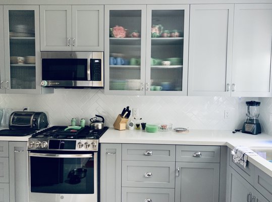 Kitchen Remodel Noho - This 80 year old home in Noho was in desperate need of a makeover. We used Grey Shaker Custom Cabinets, white subway tile installed in a herringbone pattern, and light grey Quartz countertops to bring this home into 2020!