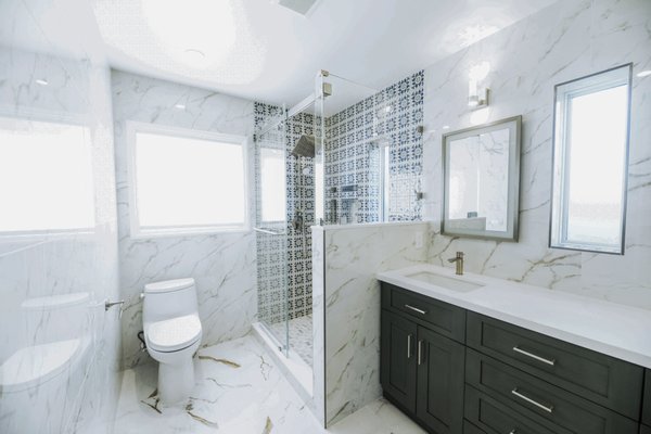 Berkeley, CA. Home Addition - Beautiful and functional home remodel that includes an addition to an existing house. This project aims to enhance the living space by adding a new room, a modern and elegant bathroom, and a laundry room equipped with a half bathroom.