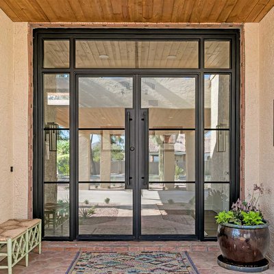 Iron Entry Doors - First Impression Ironworks offers the highest quality custom made iron entry doors for your home. These 100% American steel doors offer beauty, quality and security. Select from wrought iron or wooden doors fabricated in Arizona, designed just for you. Pair your iron entry door with matching exterior iron security doors, iron window guards, iron gates or iron railing. Customize your iron entry door with kick plates, removable sunscreens, sidelights, transoms, elegant iron hardware, artisan glass and an array of powder coat choices and faux finish options. Create your first impression with designs ranging from the traditional and elegant to modern, and everything in between! All custom-made Iron Entry Doors are available as French (double) doors or with arches.