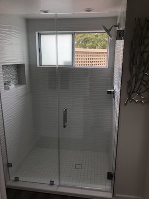 Frameless shower door - This shower door ads a great deal of style to the property, the owner had a framed shower door installed and didn’t like the outcome, they called us for a free estimate that turned into a beautiful project. Frameless shower door - This shower door ads a great deal of style to the property, the owner had a framed shower door installed and didn’t like the outcome, they called us for a free estimate that turned into a beautiful project.