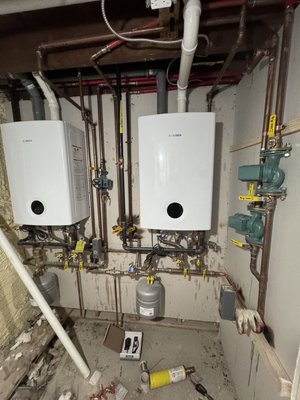 Tankless boiler install! - Installed these very efficient tankless boilers in the clients home to save on space and energy bills. Tankless boiler install! - Installed these very efficient tankless boilers in the clients home to save on space and energy bills.
