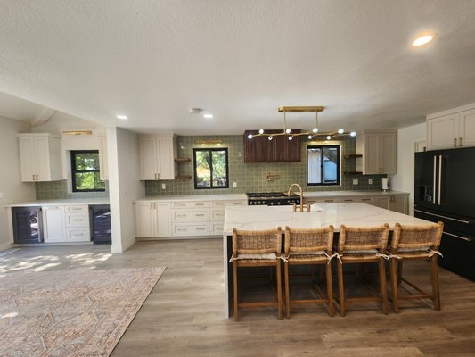 Modern Open-Concept Kitchen Remodel – West Sacramento, CA - For this kitchen remodel in West Sacramento, the Coastal Region Construction team transformed a closed, outdated space into a modern, open-concept kitchen perfect for entertaining and everyday family life.
✅ Scope of Work:
Complete demolition and removal of old cabinets, countertops, and flooring
Installation of custom shaker-style cabinetry for a timeless look
New quartz countertops with a subtle veining pattern
Modern subway tile backsplash for a clean, fresh finish
Upgraded LED recessed lighting to brighten the space
New LVP flooring for durability and easy maintenance
Fresh paint and trim work for a polished final result
✅ Design Focus:
The homeowners wanted a more functional layout, better storage, and a light, airy feel. We maximized counter space, added efficient storage solutions, and used a neutral color palette to make the kitchen feel larger and more inviting.
✅ Result:
A beautiful, highly functional kitchen with modern finishes, improved flow, and lasting quality—delivered on time and within budget. Modern Open-Concept Kitchen Remodel – West Sacramento, CA - For this kitchen remodel in West Sacramento, the Coastal Region Construction team transformed a closed, outdated space into a modern, open-concept kitchen perfect for entertaining and everyday family life.
✅ Scope of Work:
Complete demolition and removal of old cabinets, countertops, and flooring
Installation of custom shaker-style cabinetry for a timeless look
New quartz countertops with a subtle veining pattern
Modern subway tile backsplash for a clean, fresh finish
Upgraded LED recessed lighting to brighten the space
New LVP flooring for durability and easy maintenance
Fresh paint and trim work for a polished final result
✅ Design Focus:
The homeowners wanted a more functional layout, better storage, and a light, airy feel. We maximized counter space, added efficient storage solutions, and used a neutral color palette to make the kitchen feel larger and more inviting.
✅ Result:
A beautiful, highly functional kitchen with modern finishes, improved flow, and lasting quality—delivered on time and within budget.