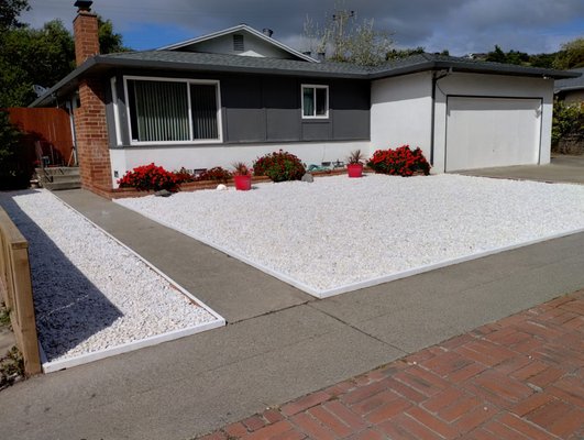 Pebble Installation Project - This project involved landscaping the front yard with white pebbles and white edging. Pebble Installation Project - This project involved landscaping the front yard with white pebbles and white edging.