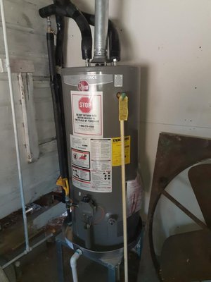 Water heater - We installed a water heater and a new faucet and sink bowel. Water heater - We installed a water heater and a new faucet and sink bowel.