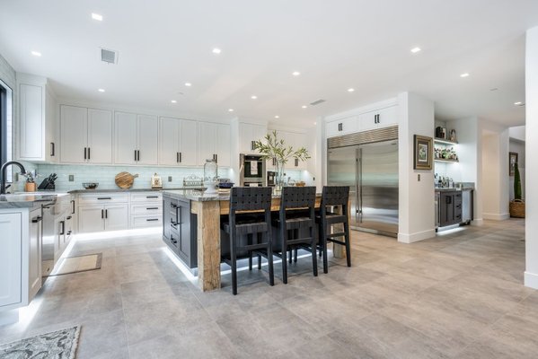 Monarch Beach, Dana Point "Classic Yet Modern" Kitchen - This Classic Style Face Frame Cabinetry with Inset Doors, Showcasing Modern Features such as: Premium Baked on Painted Finished, Reclaimed Columns & Valance on the Island Sitting Area, and a Chiseled Edge on the Island Quartzite Countertops. Monarch Beach, Dana Point "Classic Yet Modern" Kitchen - This Classic Style Face Frame Cabinetry with Inset Doors, Showcasing Modern Features such as: Premium Baked on Painted Finished, Reclaimed Columns & Valance on the Island Sitting Area, and a Chiseled Edge on the Island Quartzite Countertops.